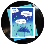 ombre blue and turquoise fade with white rain clouds & turquoise and blue raindrops and a blue umbrella with a pink heart at the top featuring song lyrics from the friends theme songs that say I'll be there for you
